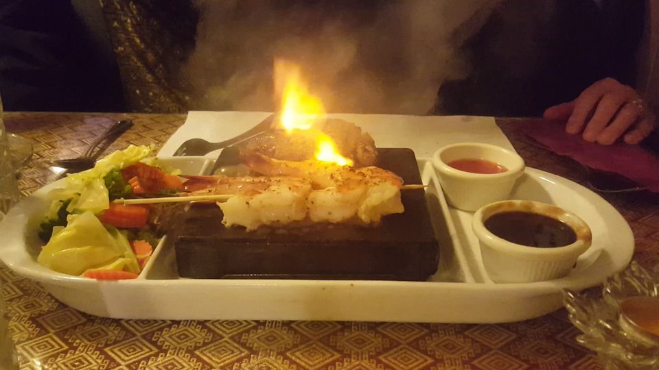 Thai curries and noodles served in a cozy space.
