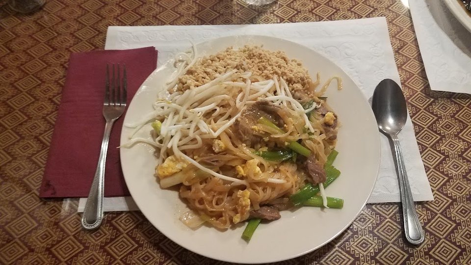 Printed menu with appetizers, soups, and noodle dishes.