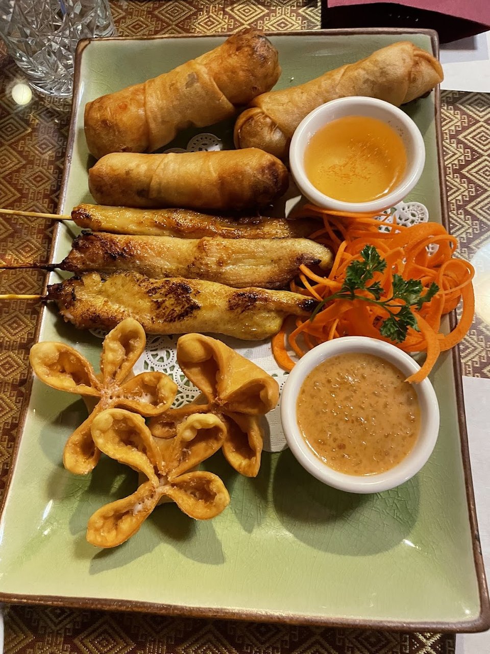 Printed menu with appetizers, soups, and noodle dishes.