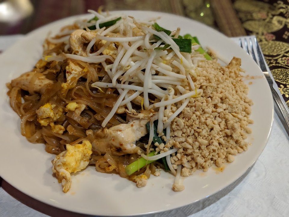 Printed menu with appetizers, soups, and noodle dishes.